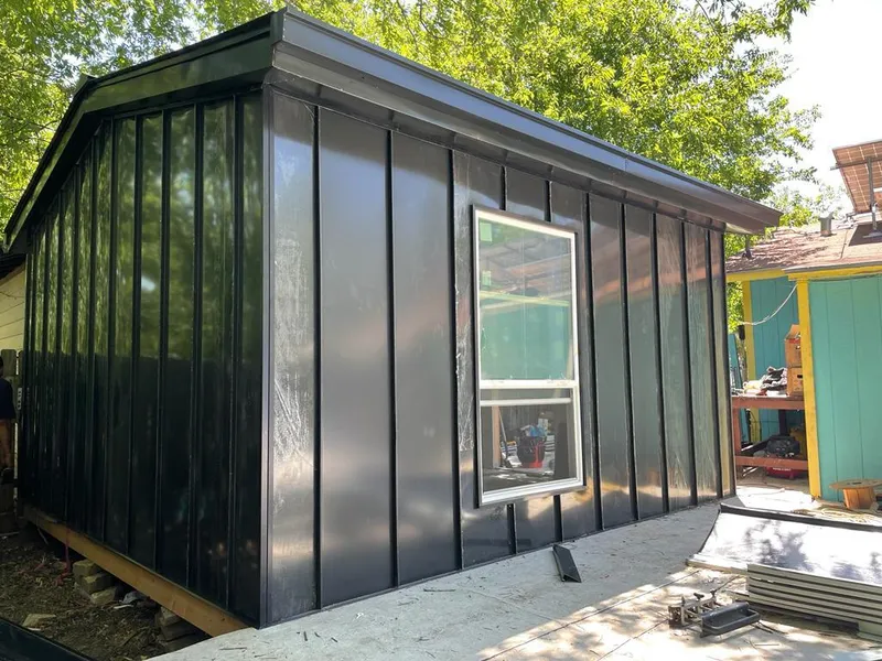 Black standing seam metal wall panels for Roof Inspection in Newburyport