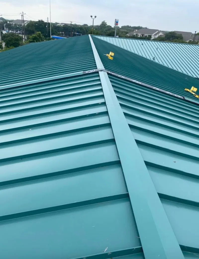 Green commercial metal roof ridge and valley for Metal Roof Repair in Newburyport